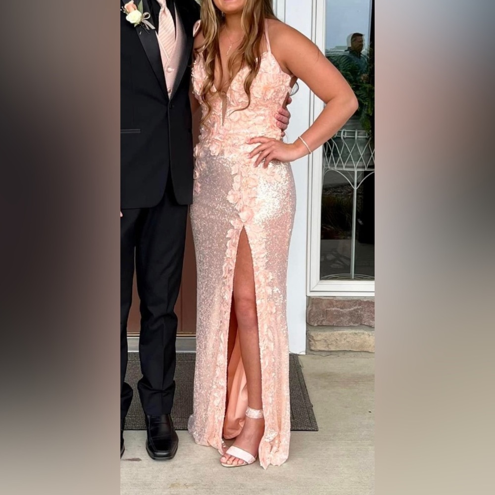 Jovani prom dress. Size 12, altered to a size 8. Peach color $300